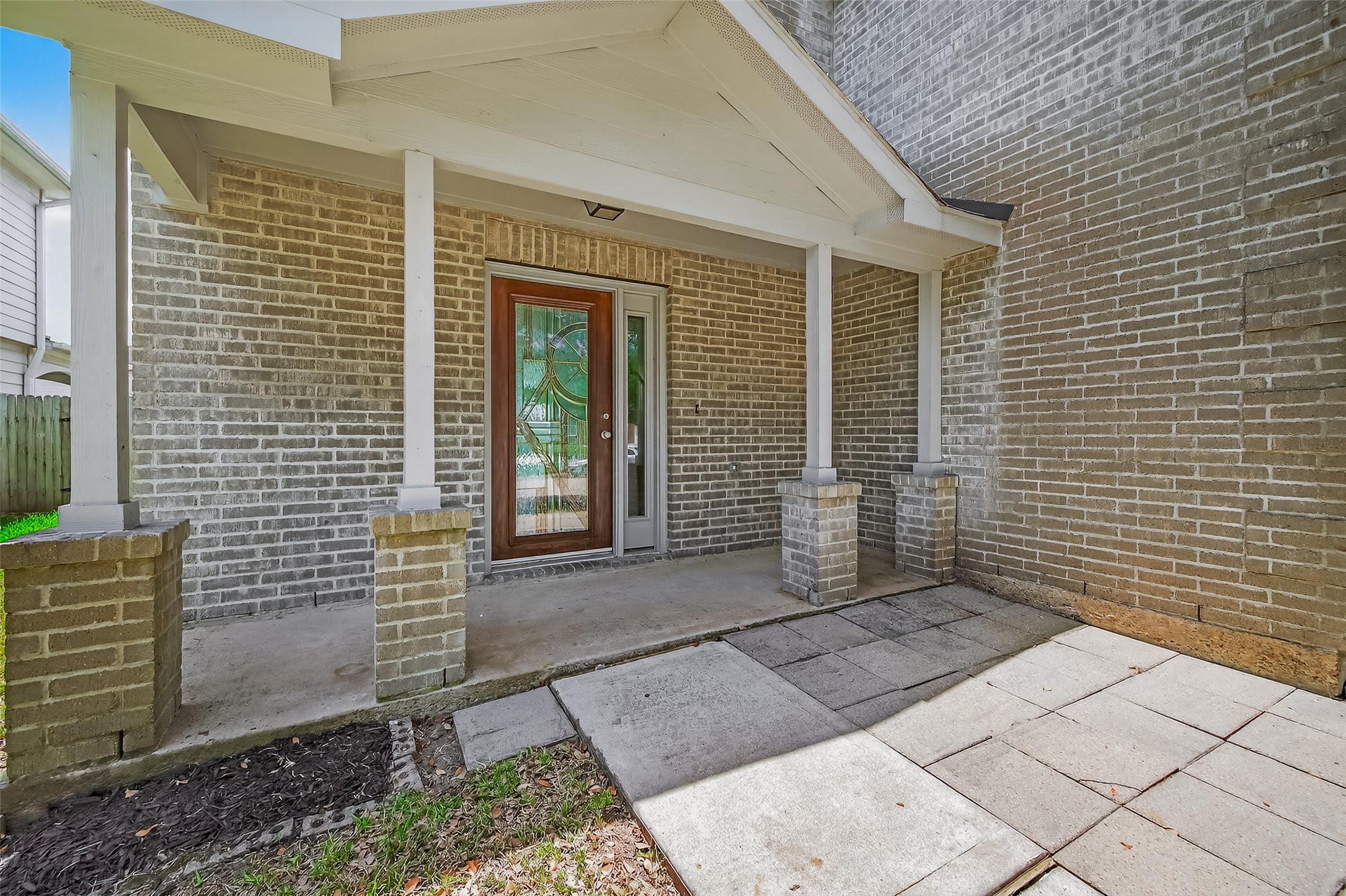 20907 Baronsledge Lane Katy, TX 77449 - Photo 4 of 50 a view of a brick house with a yard
