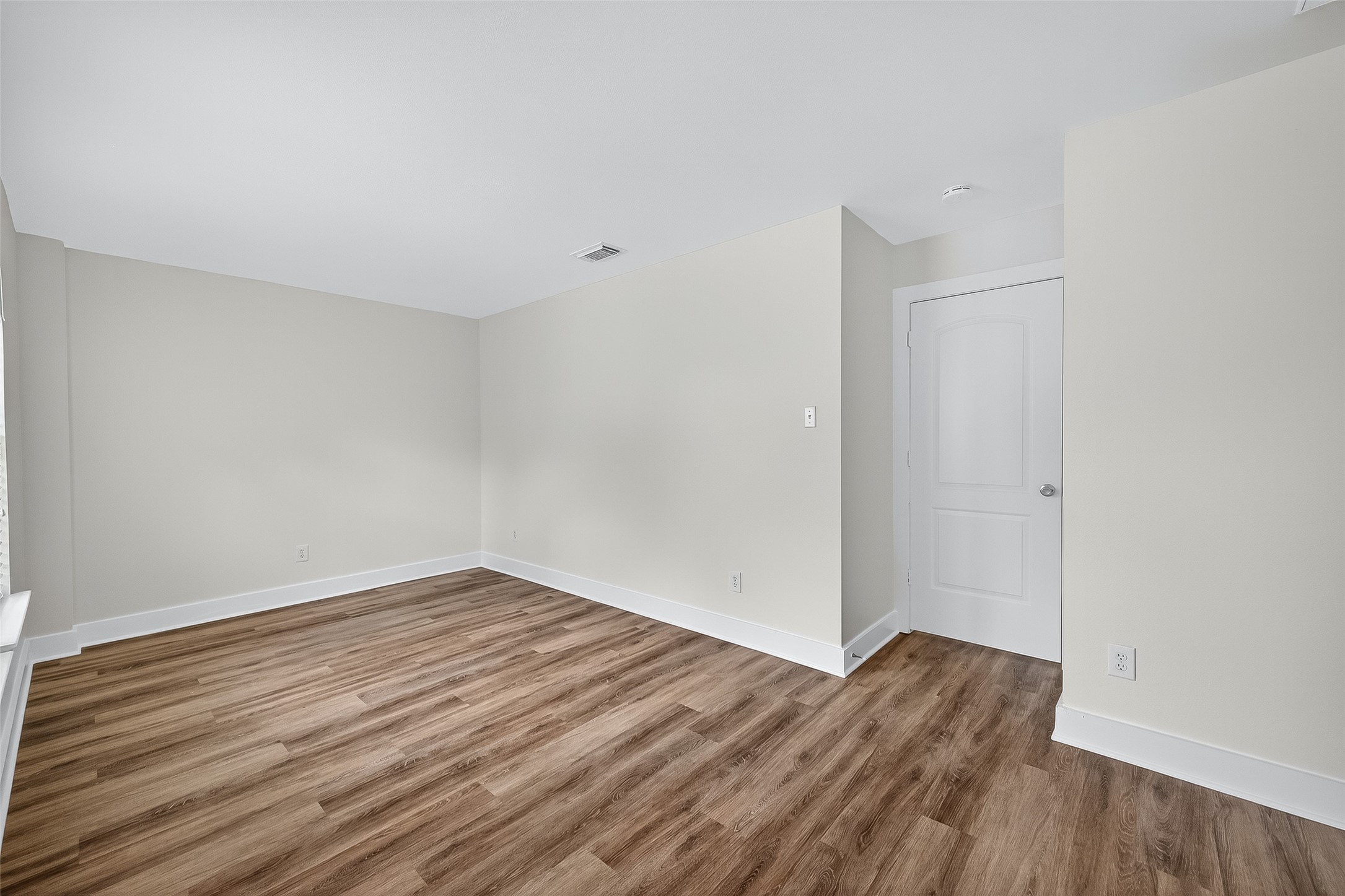 20907 Baronsledge Lane Katy, TX 77449 - Photo 41 of 50 a view of an empty room with wooden floor