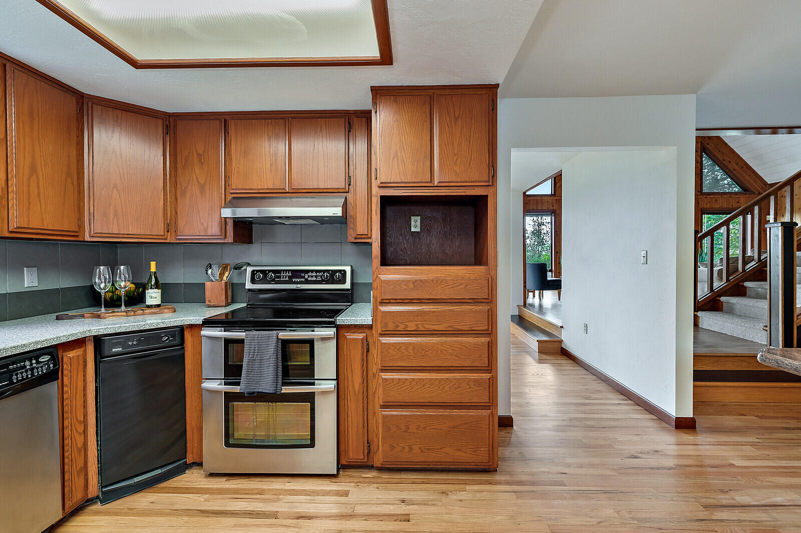3181 Old Stage Road Central Point, OR 97502 - Photo 19 of 78 a kitchen with stainless steel appliances granite countertop a stove and a refrigerator