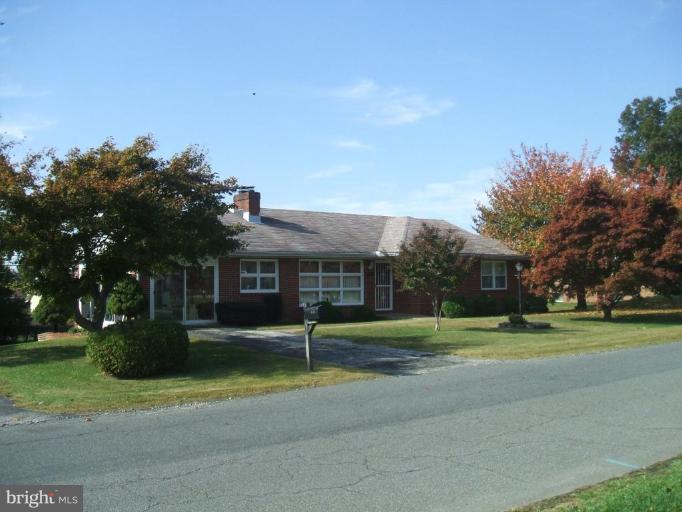 4113 Kahlston Road Nottingham, MD 21236 - Photo 1 of 16 a front view of house with yard and green space