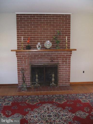 4113 Kahlston Road Nottingham, MD 21236 - Photo 7 of 16 a brick oven with fireplace on it