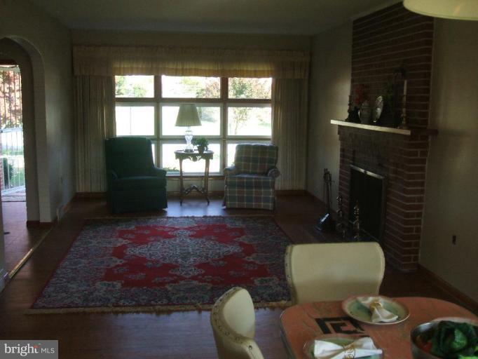 4113 Kahlston Road Nottingham, MD 21236 - Photo 9 of 16 a living room with furniture rug and window