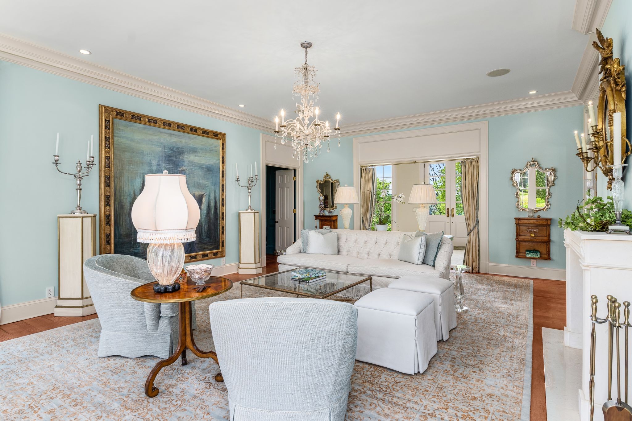 1577 Moran Road Franklin, TN 37069 - Photo 30 of 70 a living room with furniture and a chandelier
