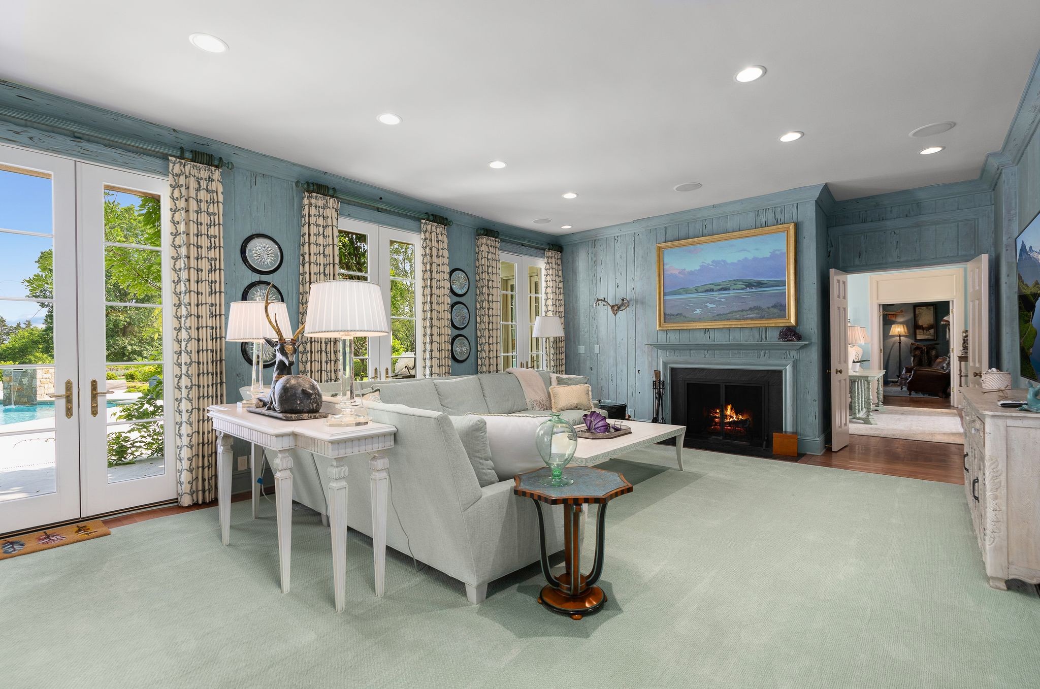 1577 Moran Road Franklin, TN 37069 - Photo 32 of 70 a living room with furniture a fireplace and a table