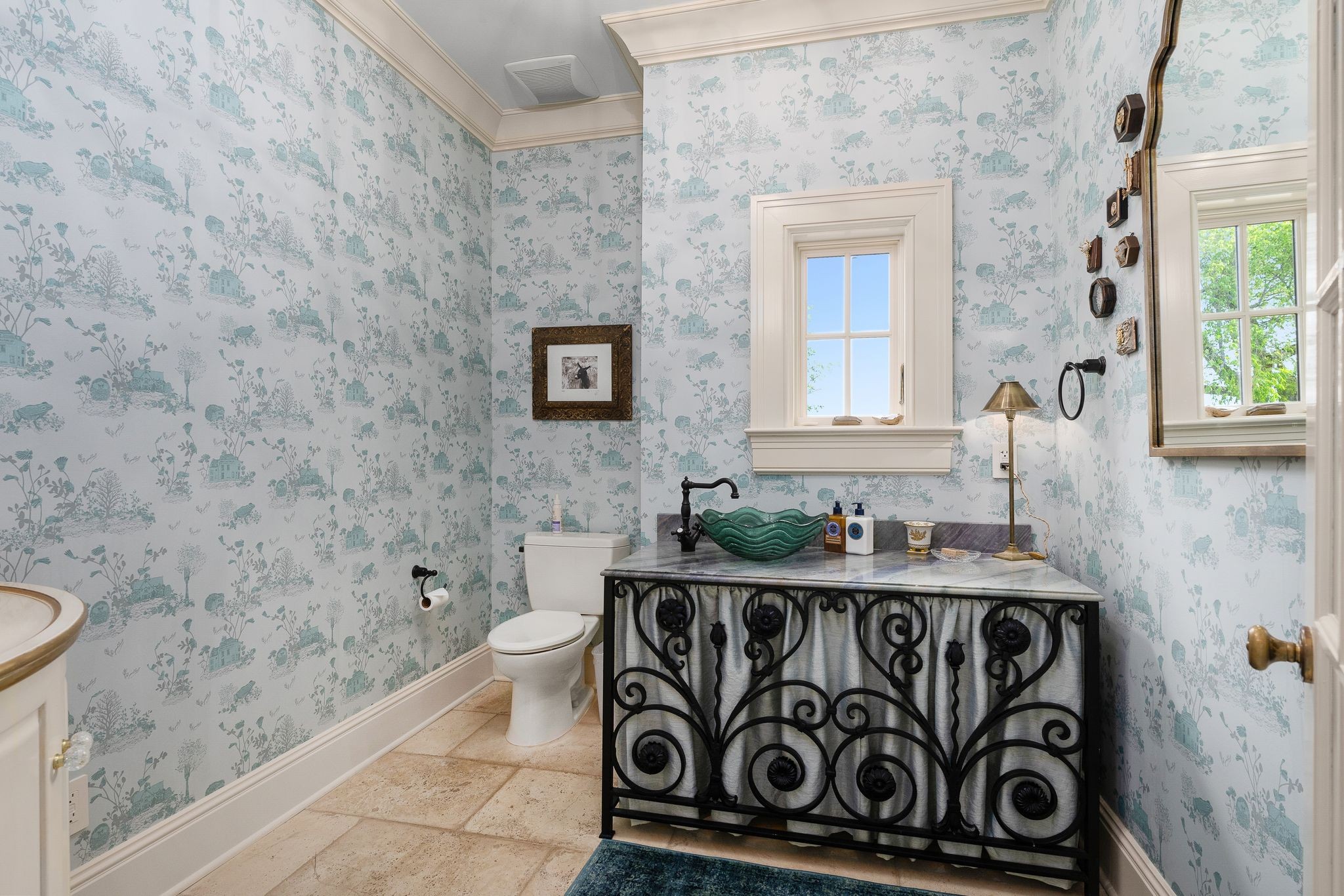 1577 Moran Road Franklin, TN 37069 - Photo 51 of 70 a bathroom with a toilet a sink and mirror