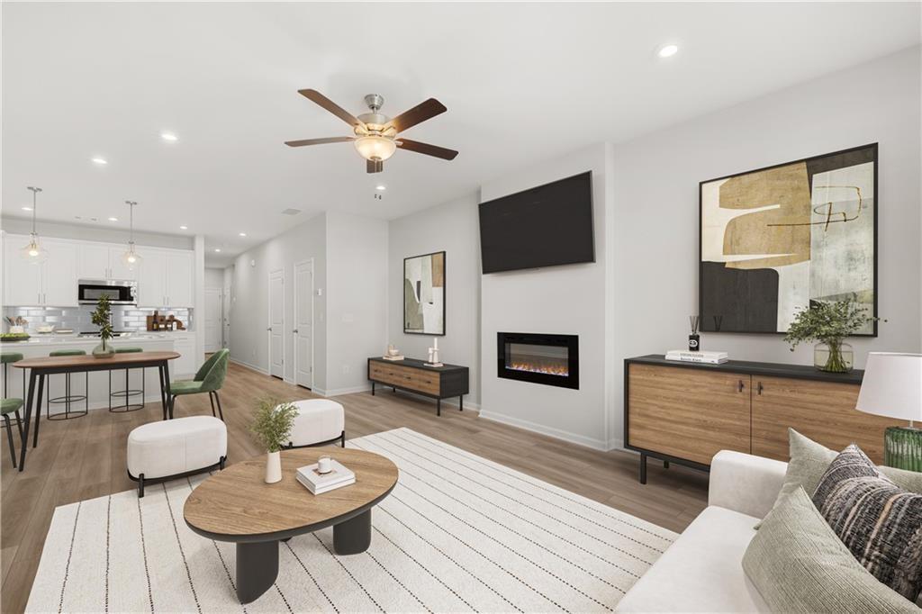 117 Pk Rdg Circle Emerson, GA 30120 - Photo 11 of 49 a living room with furniture a fireplace and a flat screen tv