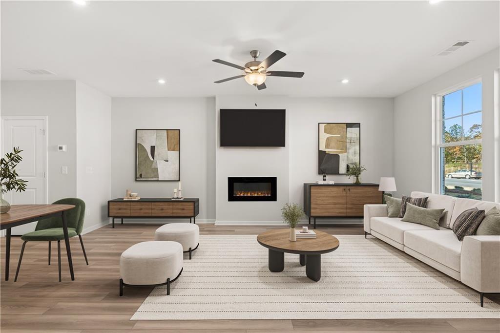 117 Pk Rdg Circle Emerson, GA 30120 - Photo 12 of 49 a living room with furniture a rug and a fireplace