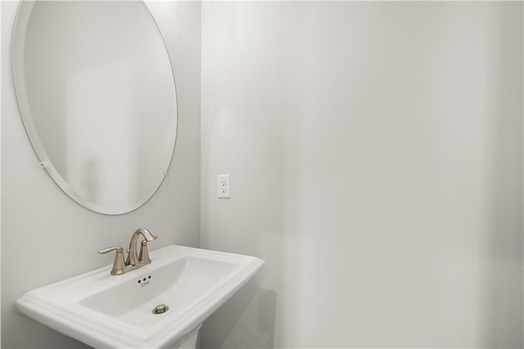 117 Pk Rdg Circle Emerson, GA 30120 - Photo 13 of 49 a bathroom with a sink and a mirror