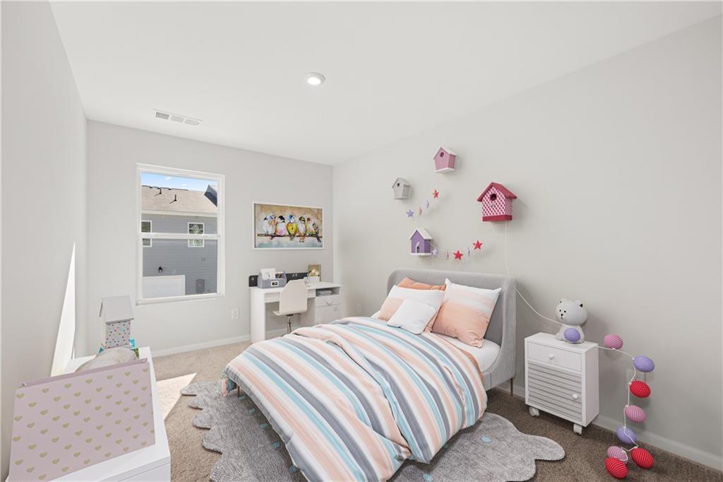 117 Pk Rdg Circle Emerson, GA 30120 - Photo 22 of 49 a bedroom with a bed and a couch