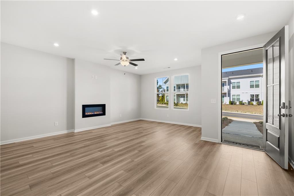 117 Pk Rdg Circle Emerson, GA 30120 - Photo 23 of 49 a view of an empty room with wooden floor and a window