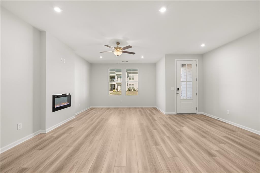 117 Pk Rdg Circle Emerson, GA 30120 - Photo 37 of 49 an empty room with windows and ceiling fan