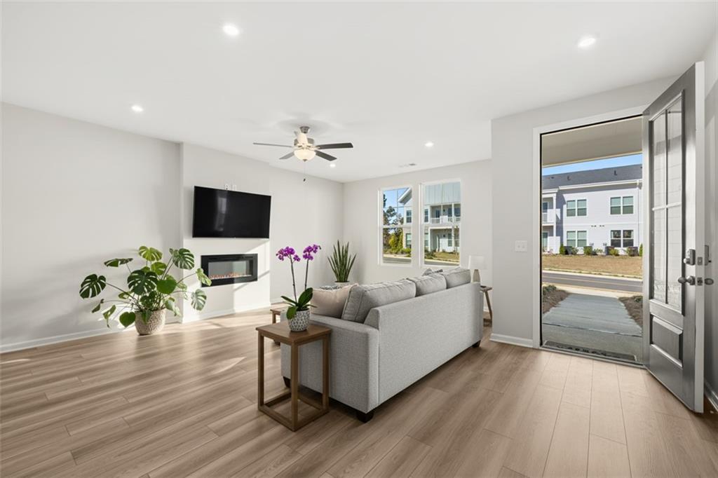 117 Pk Rdg Circle Emerson, GA 30120 - Photo 9 of 49 a living room with furniture and a flat screen tv