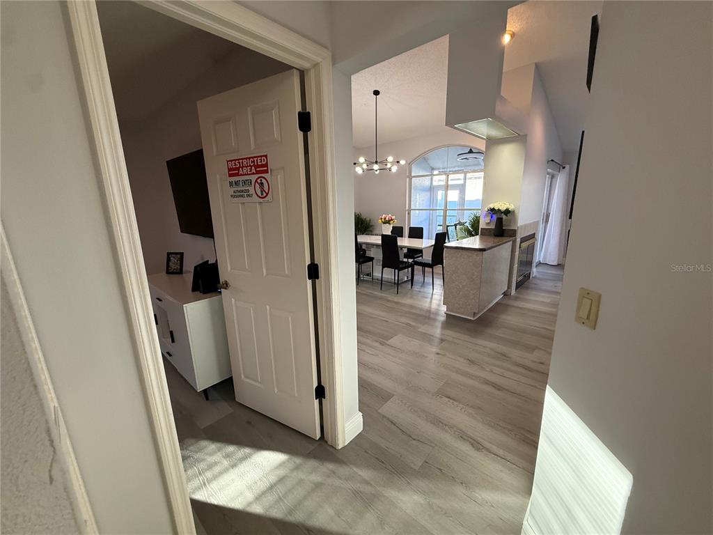 10400 Casa Grande Circle Spring Hill, FL 34608 - Photo 28 of 55 a view of a livingroom with furniture and a refrigerator