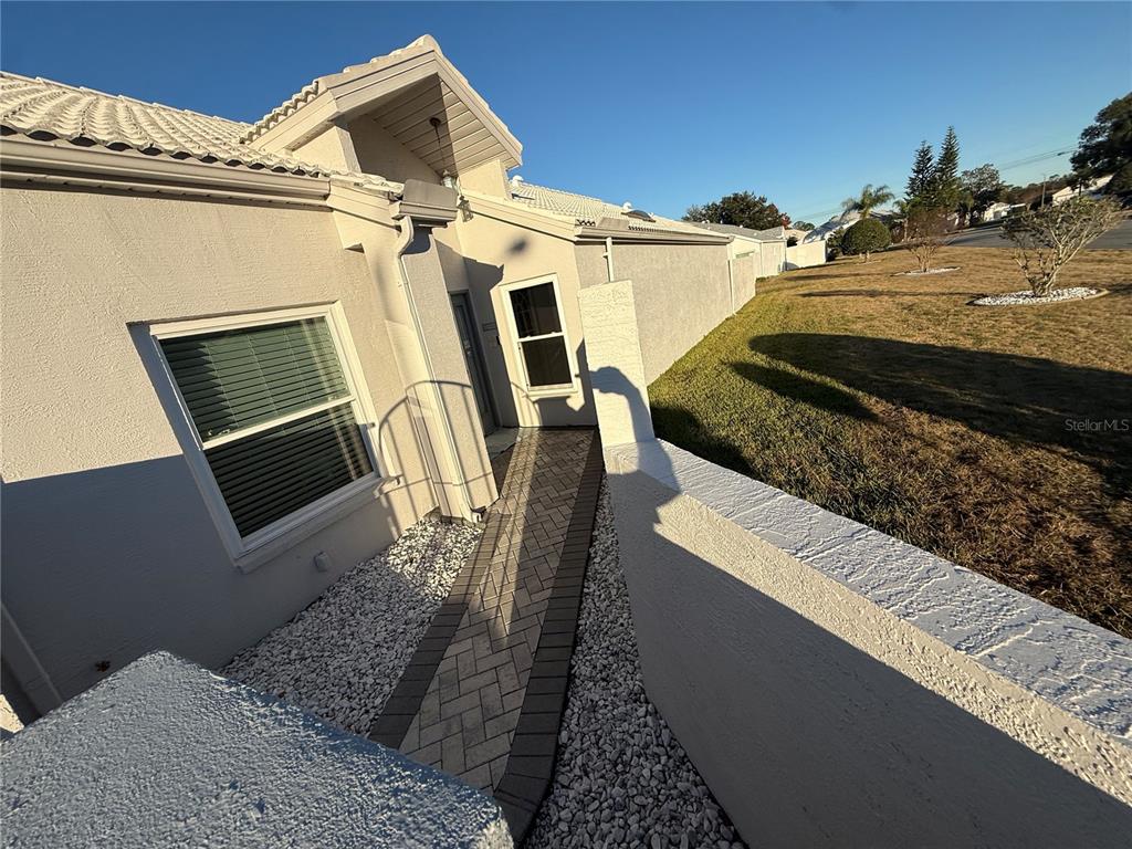 10400 Casa Grande Circle Spring Hill, FL 34608 - Photo 40 of 55 a view of a house with a door
