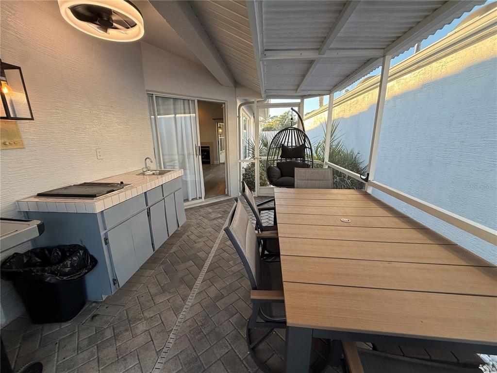 10400 Casa Grande Circle Spring Hill, FL 34608 - Photo 48 of 55 a kitchen with a sink and wooden floor