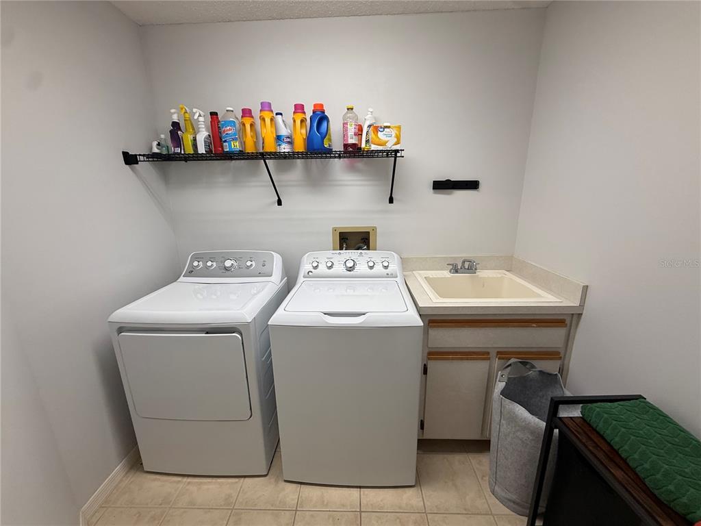 10400 Casa Grande Circle Spring Hill, FL 34608 - Photo 53 of 55 a utility room with dryer and washer