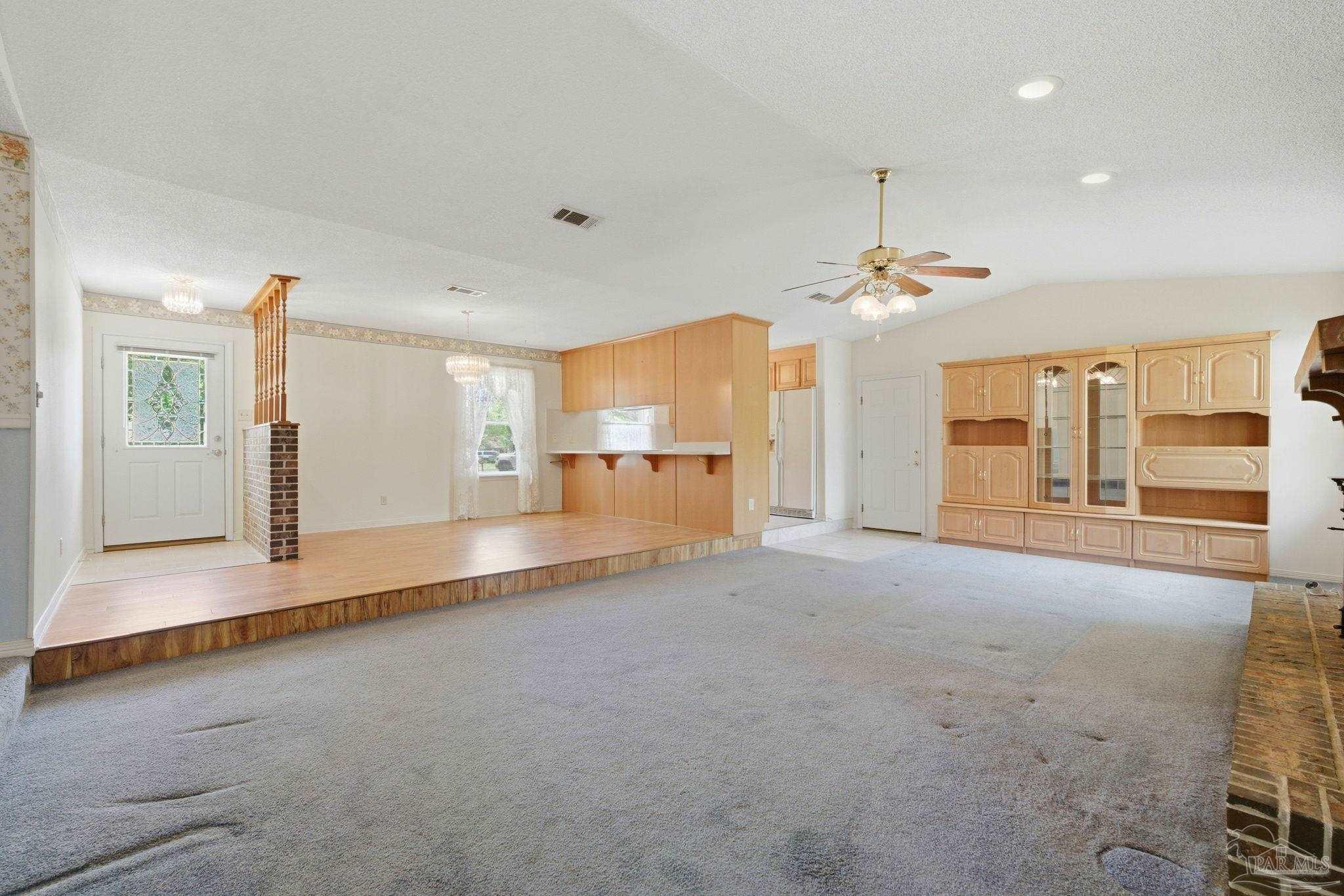 4320 Grant Street Pace, FL 32571 - Photo 4 of 27 a view of a kitchen with a sink and cabinets