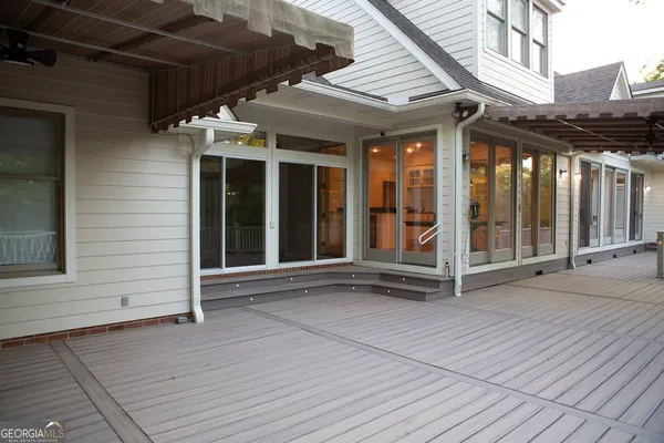 a view of a house with a large window