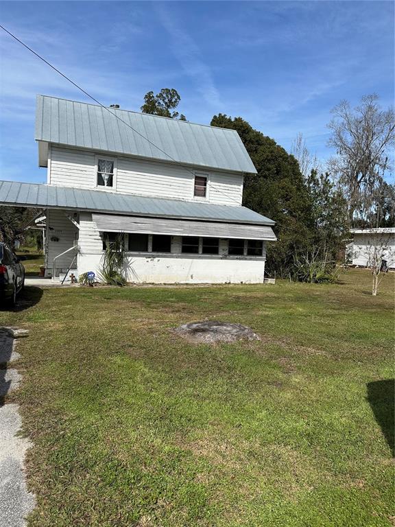 5909 Southeast Foss Road Belleview, FL 34420 - Photo 1 of 1 Front of Home