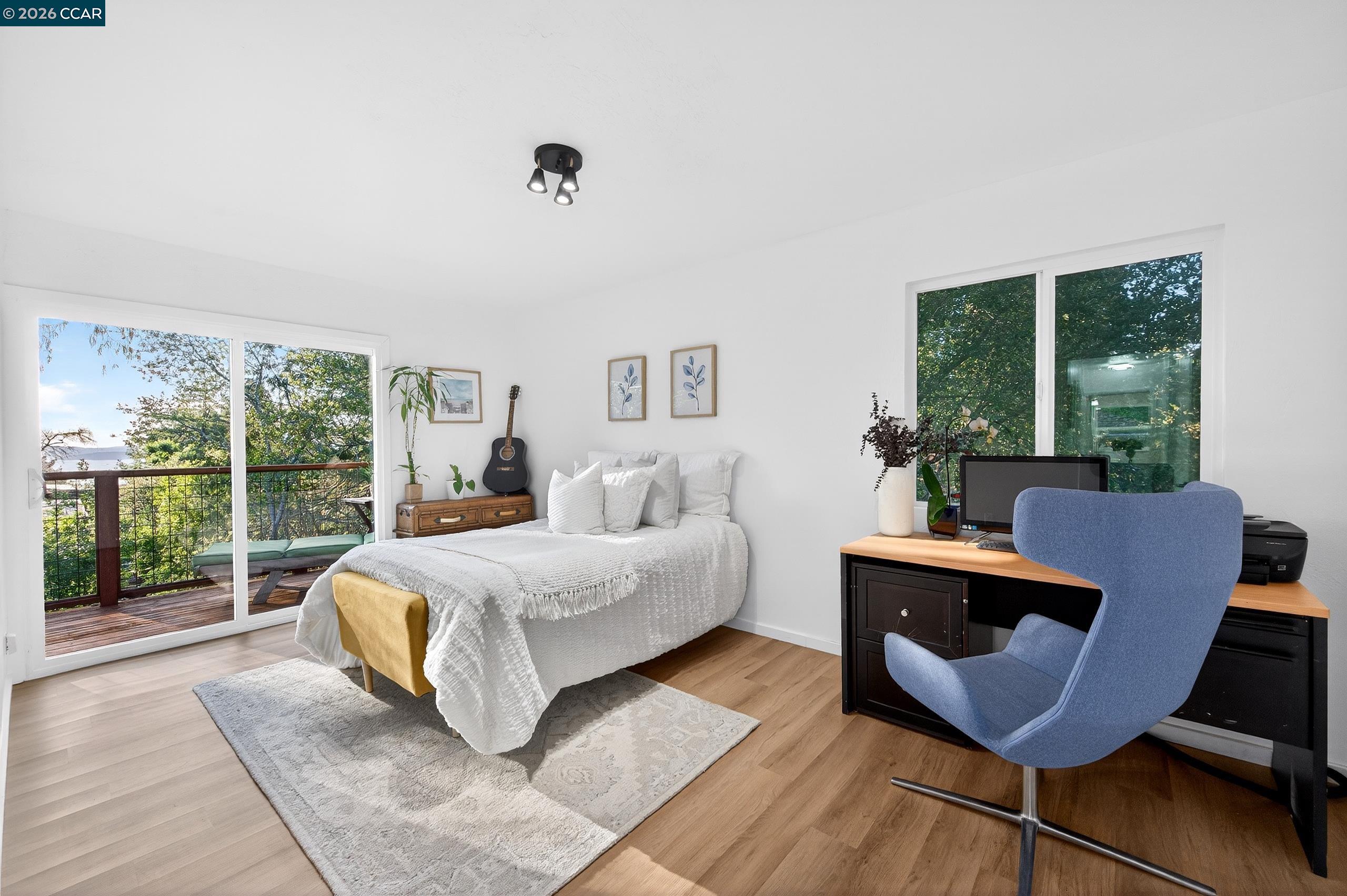 230 Fairlawn Drive Berkeley, CA 94708 - Photo 19 of 58 a living room with furniture and a large window