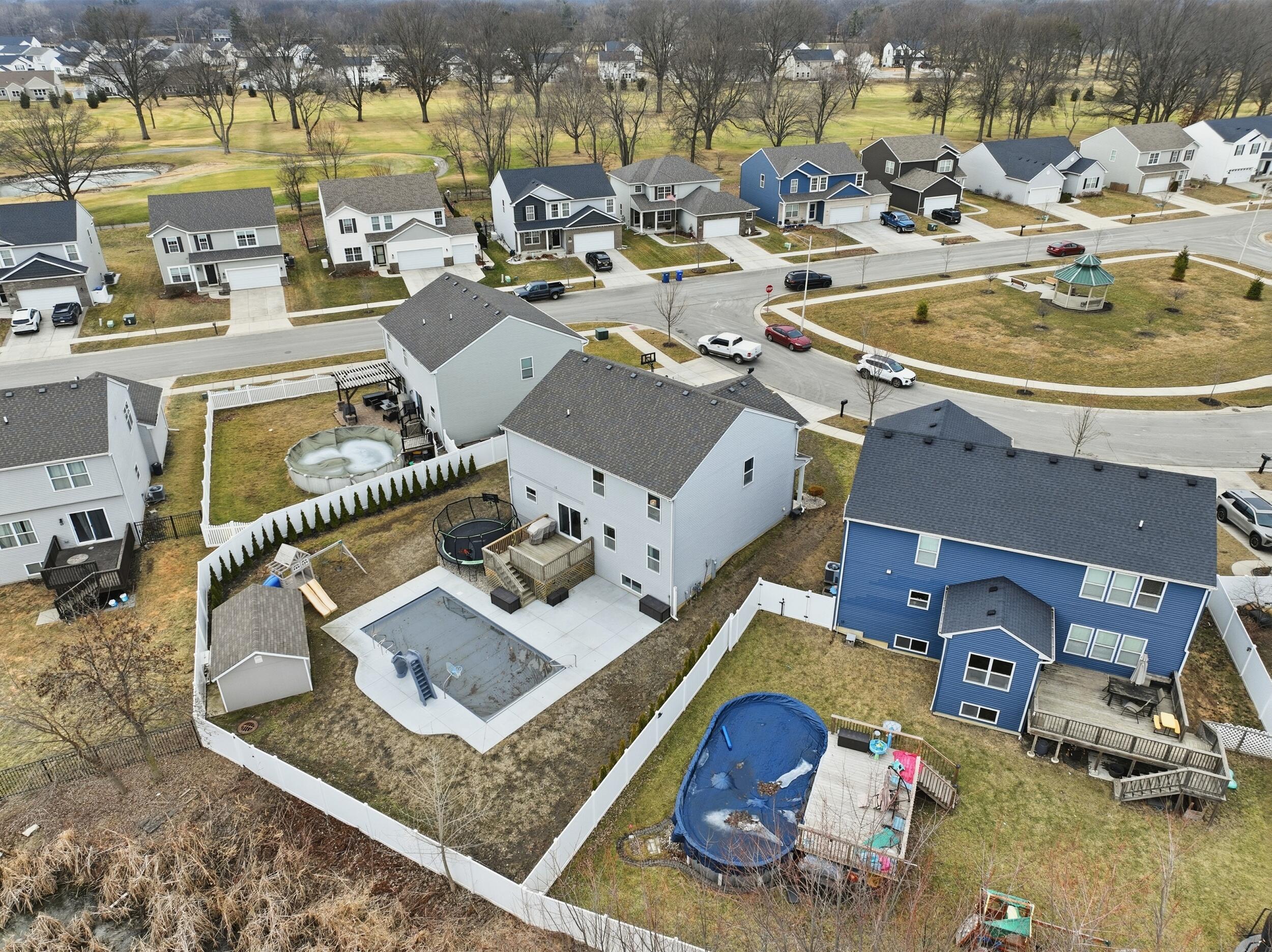 13181 Taft Street Crown Point, IN 46307 - Photo 32 of 42 an aerial view of a swimming pool with outdoor seating
