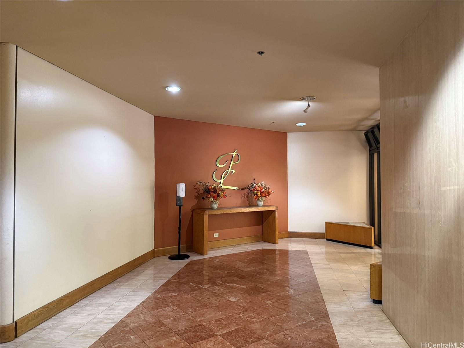 5333 Likini Street, Unit 1008 Honolulu, HI 96818 - Photo 11 of 17 a view of a hallway to a room