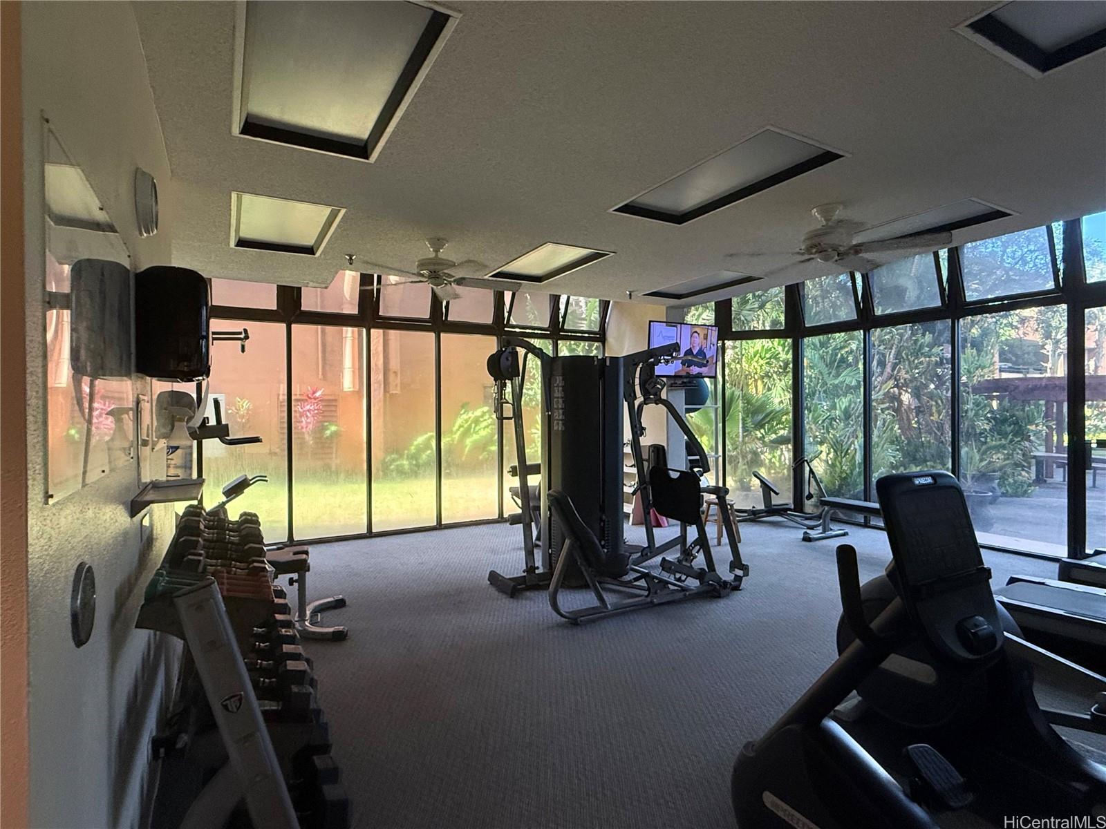 5333 Likini Street, Unit 1008 Honolulu, HI 96818 - Photo 16 of 17 a view of a room with gym equipment