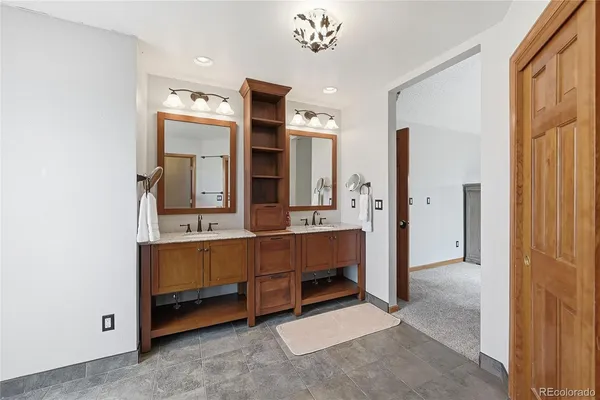 a room with cabinets and a dresser