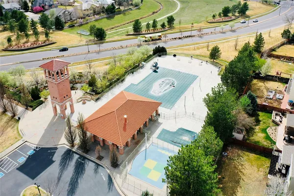 an aerial view of a house with a swimming pool
