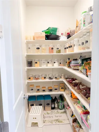 a shelf with books and knick knacks on it