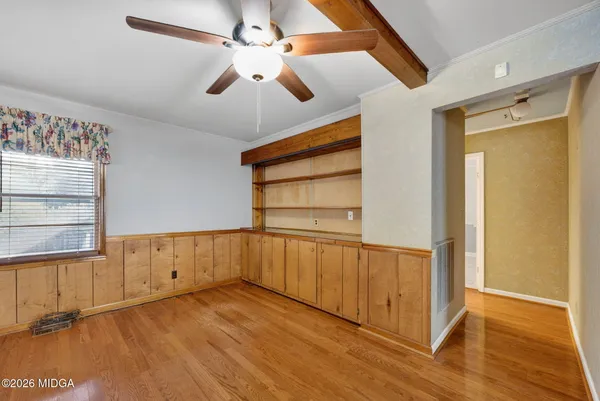 a view of an empty room with a window
