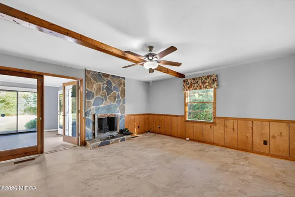wooden floor and fireplace in living room