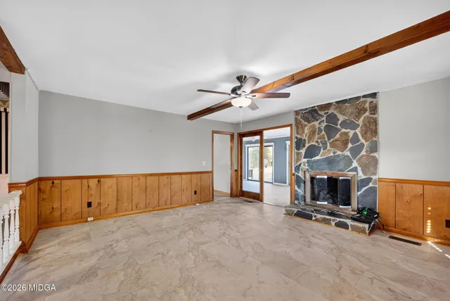 an empty room with windows