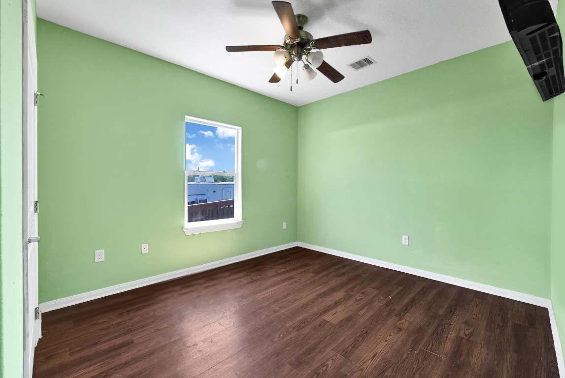 771 10th Street Dickinson, TX 77539 - Photo 17 of 24 a view of room with window and ceiling fan