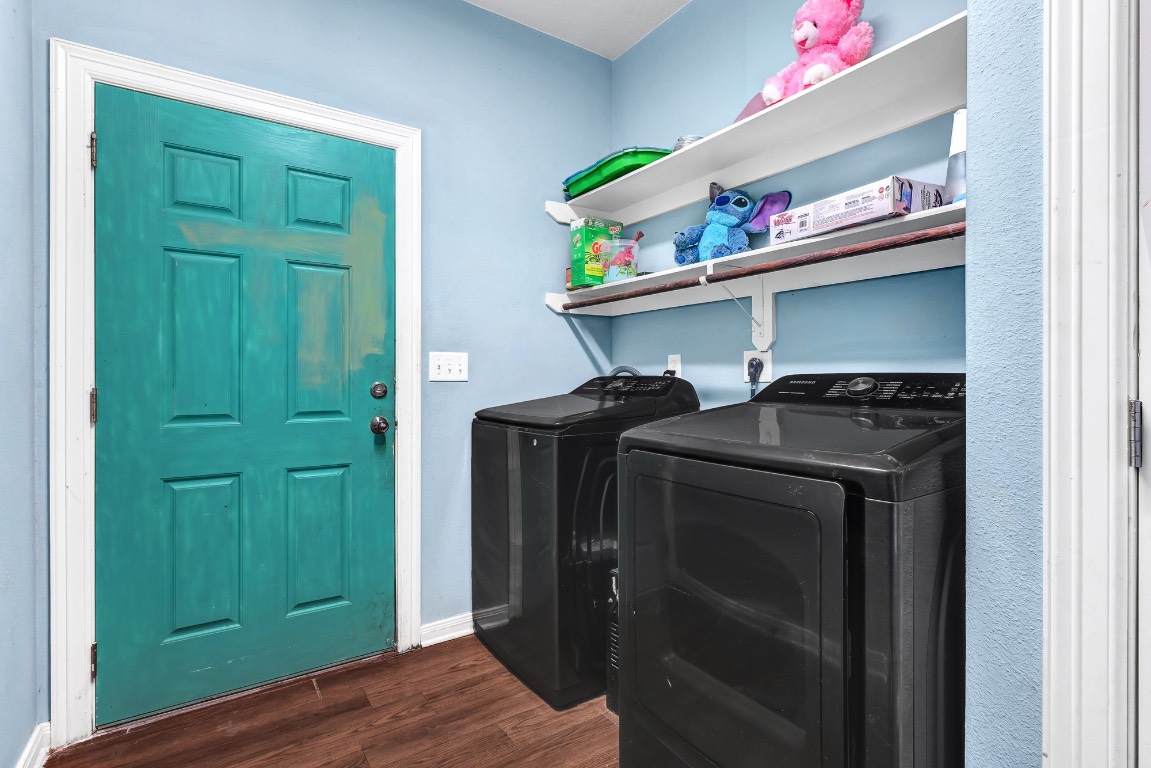 771 10th Street Dickinson, TX 77539 - Photo 19 of 24 a view of walk in closet with clothes and shoes