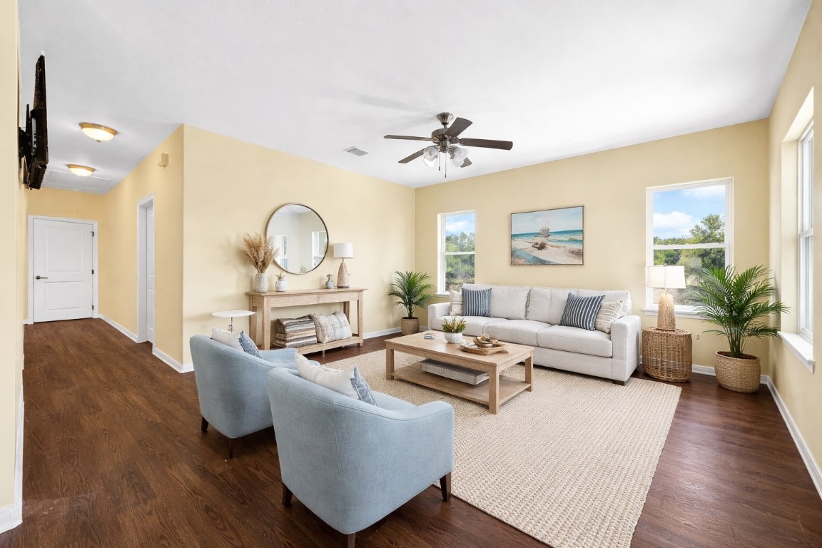 771 10th Street Dickinson, TX 77539 - Photo 10 of 24 a living room with furniture and a wooden floor