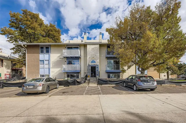 a car parked in front of a building