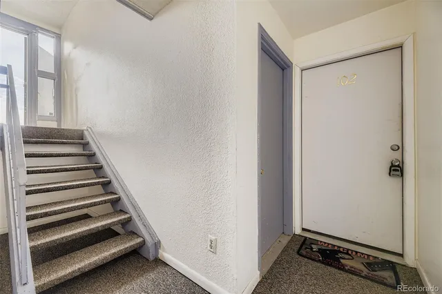 a view of an entryway with staircase