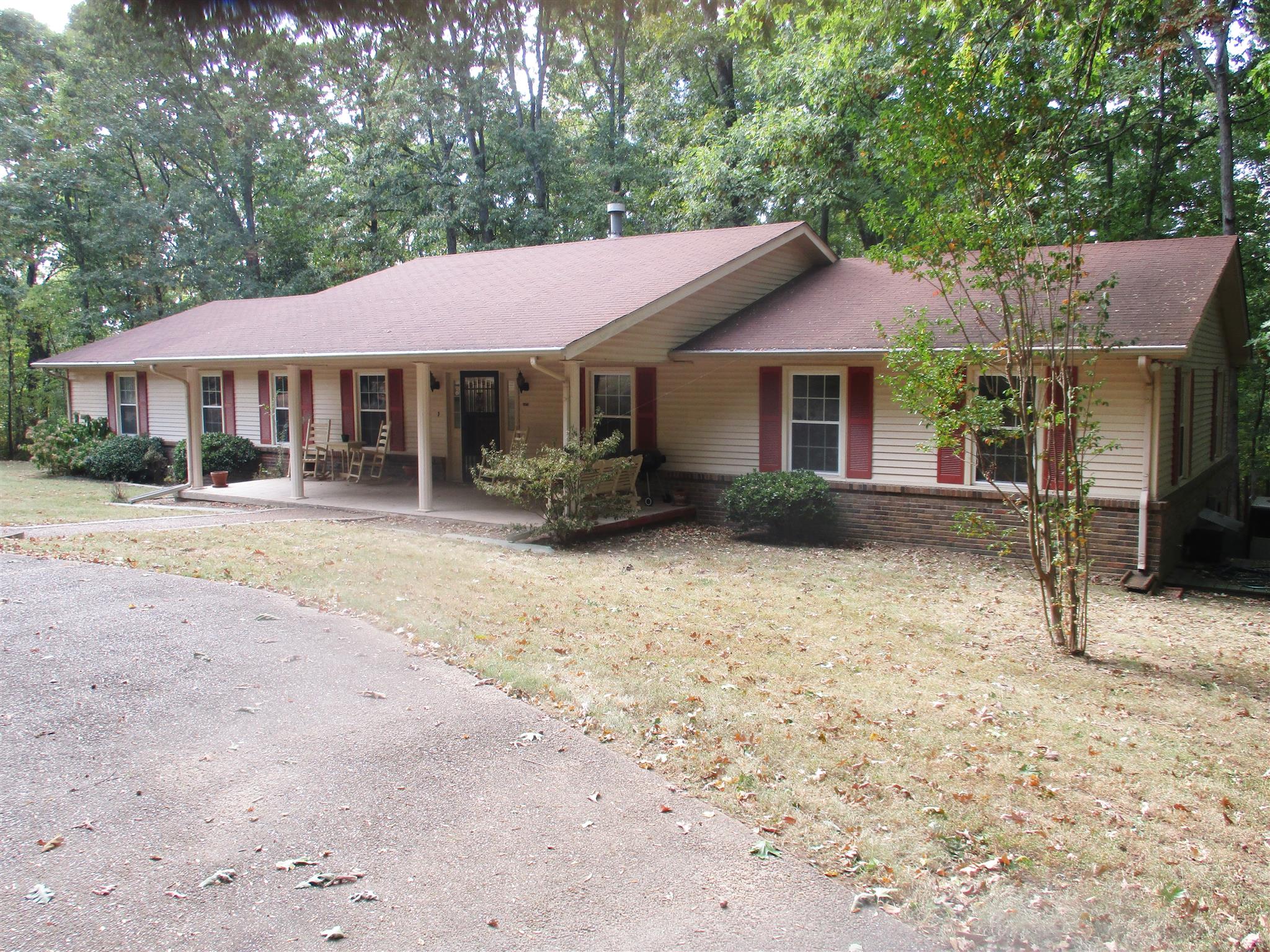1073 West Point Road Lawrenceburg, TN 38464 - Photo 1 of 24 a backyard of a house with yard and tree