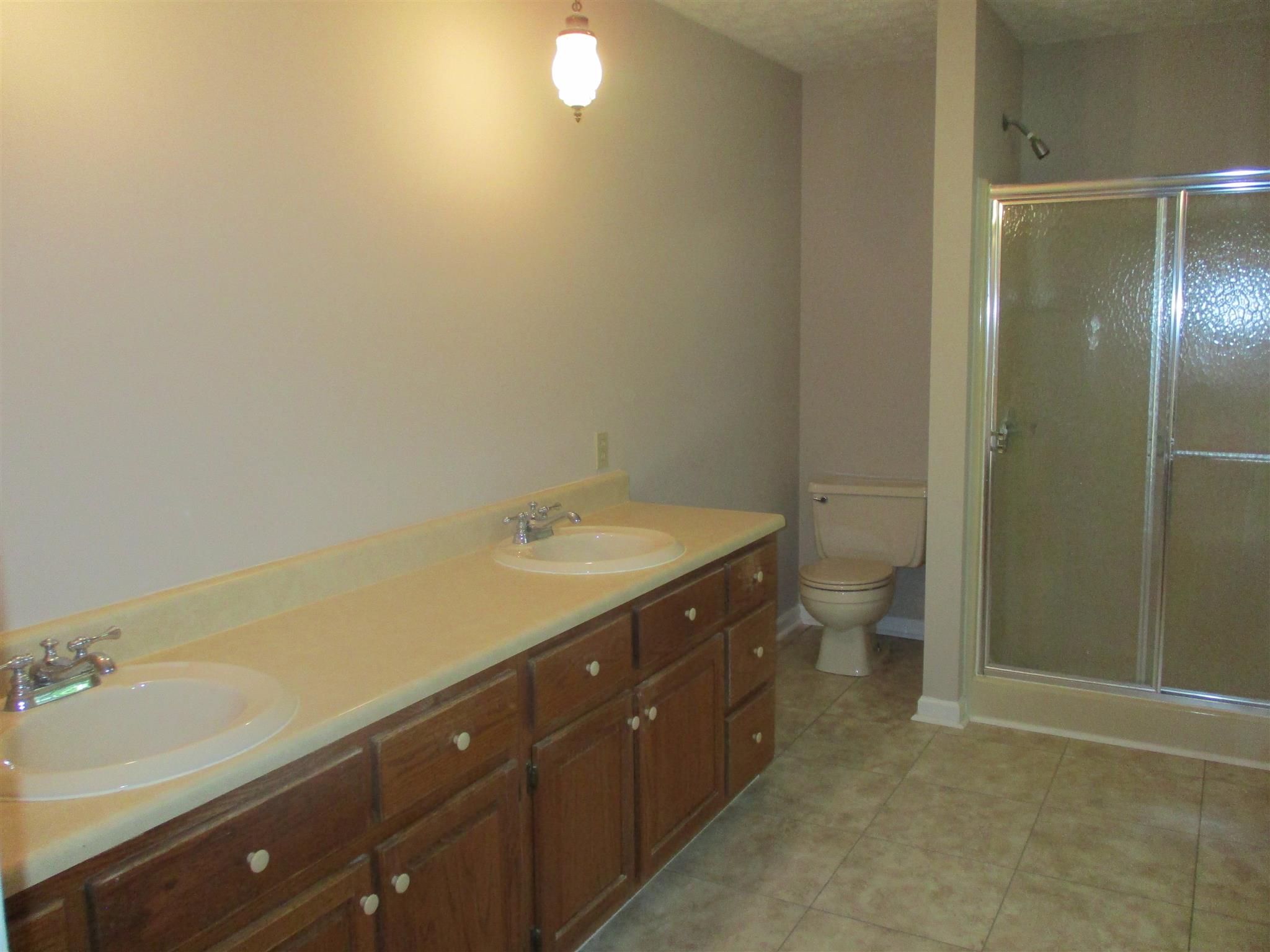 1073 West Point Road Lawrenceburg, TN 38464 - Photo 21 of 24 a bathroom with a sink and a mirror