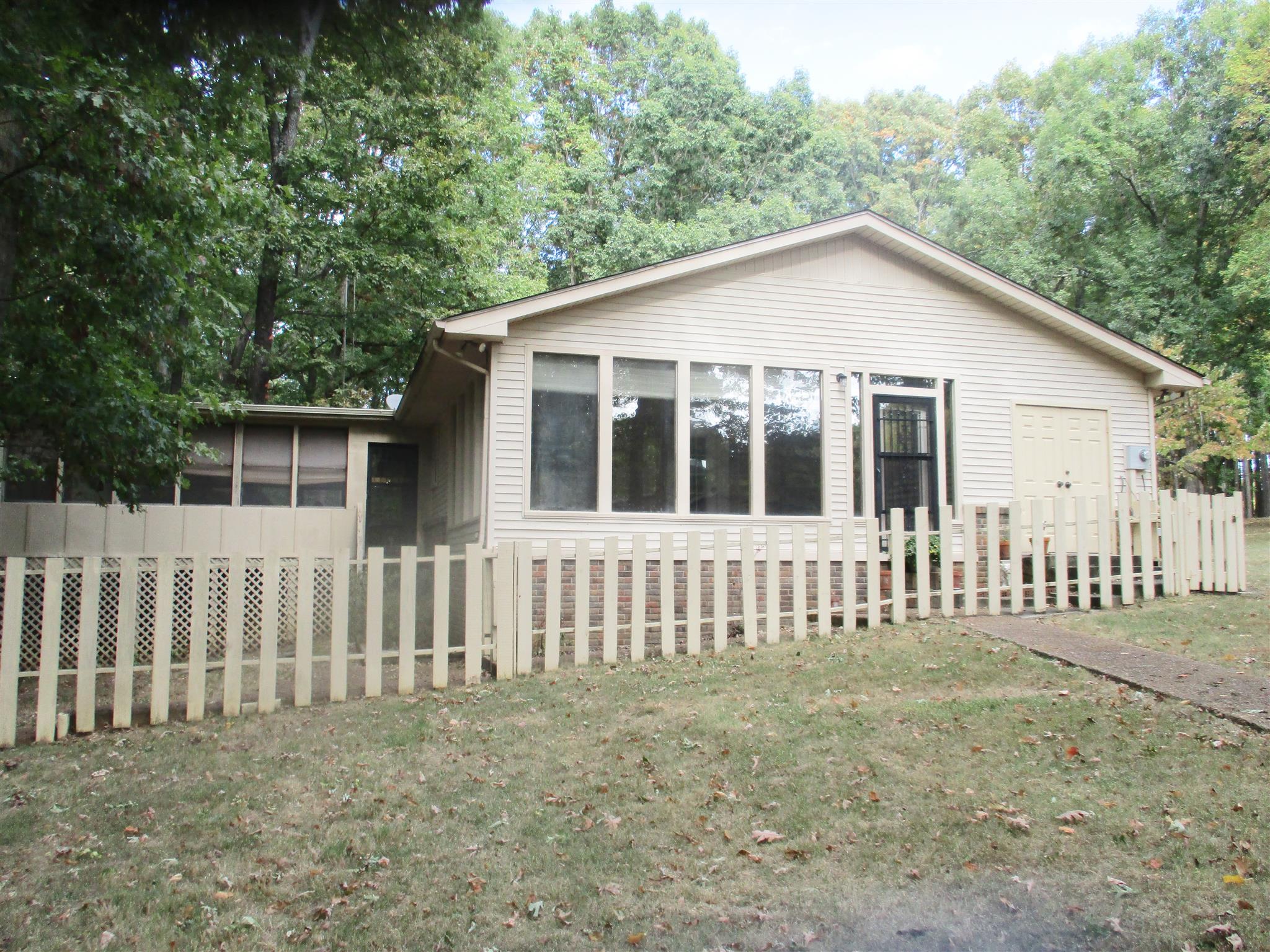 1073 West Point Road Lawrenceburg, TN 38464 - Photo 4 of 24 a view of a house with a yard