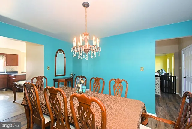 a view of a hallway with entryway door