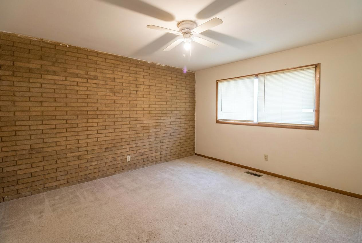 45 North McAree Road Waukegan, IL 60085 - Photo 7 of 12 a view of an empty room with a window