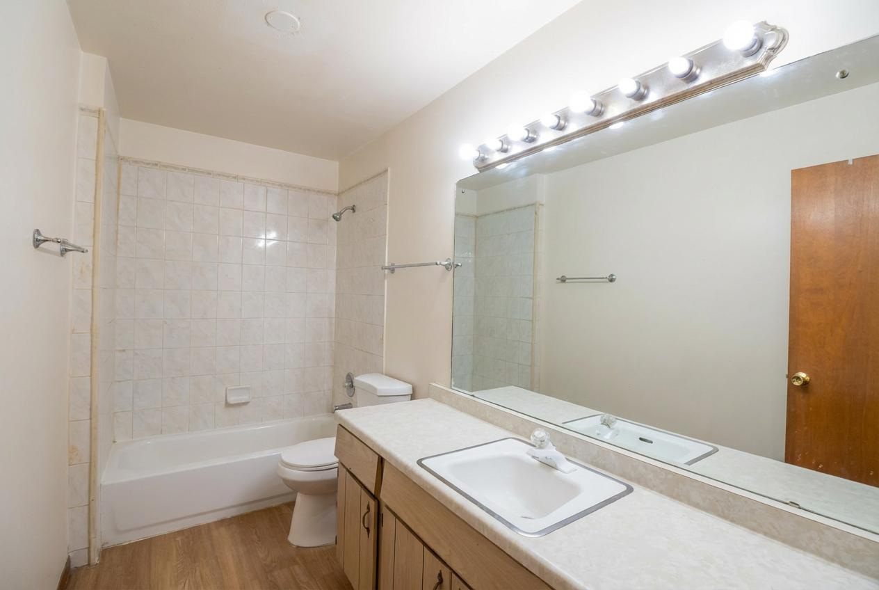45 North McAree Road Waukegan, IL 60085 - Photo 8 of 12 a bathroom with a sink a toilet and shower