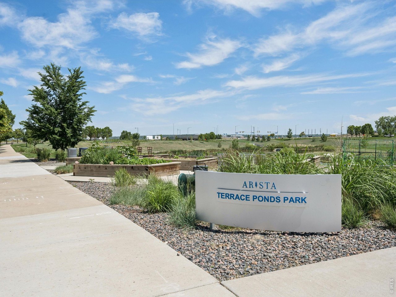 11202 Colony Circle Broomfield, CO 80021 - Photo 22 of 23 a sign on the side of the river