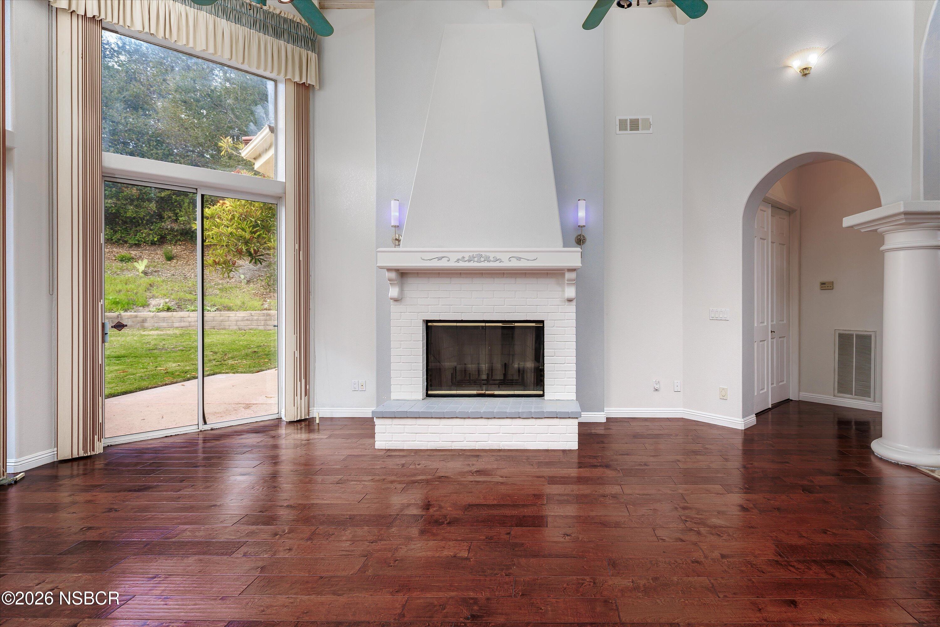2655 Adobe Falls Road Lompoc, CA 93436 - Photo 13 of 51 a view of an empty room with window and wooden floor