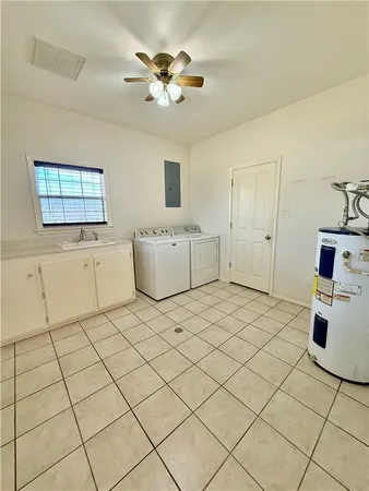 a bathroom with a toilet a sink and a mirror