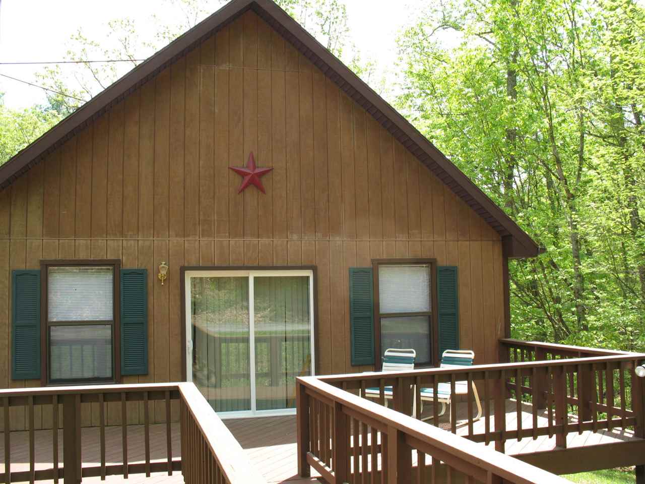 204 Sycamore Road Mount Jackson, VA 22842 - Photo 2 of 20 a view of a balcony with floor to ceiling window and wooden floor