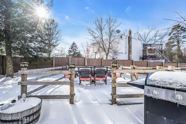 a outdoor space with patio furniture and a fire pit