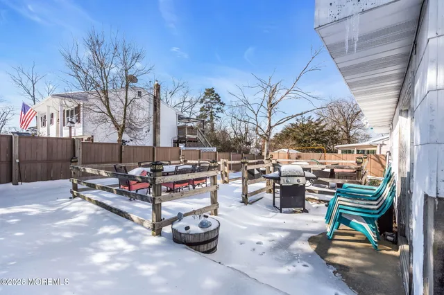 a view of a backyard of the house